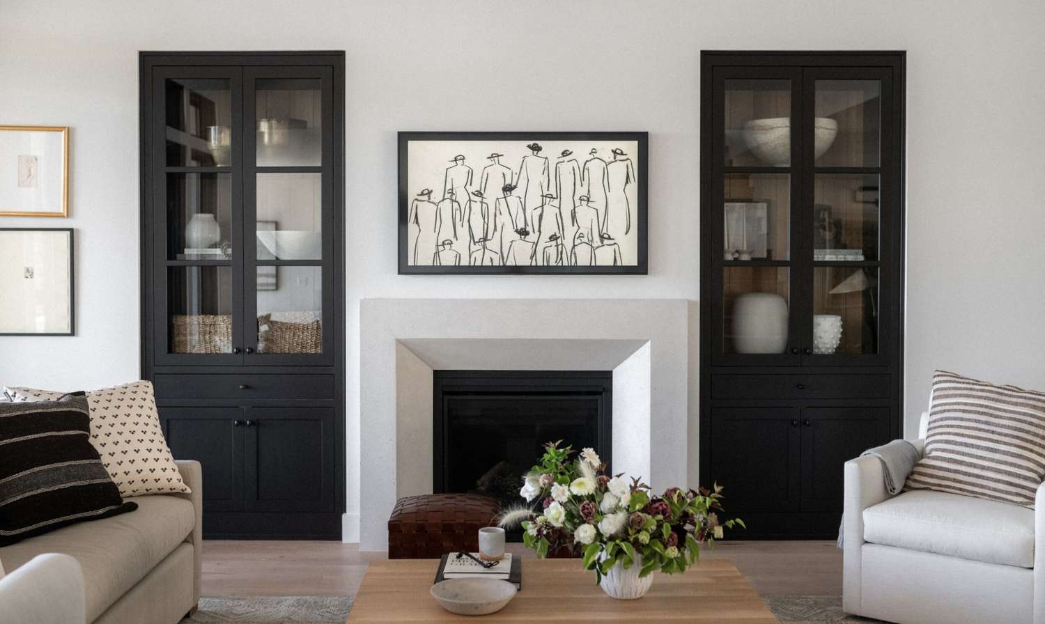 A free-standing living room storage for books and decor pieces
