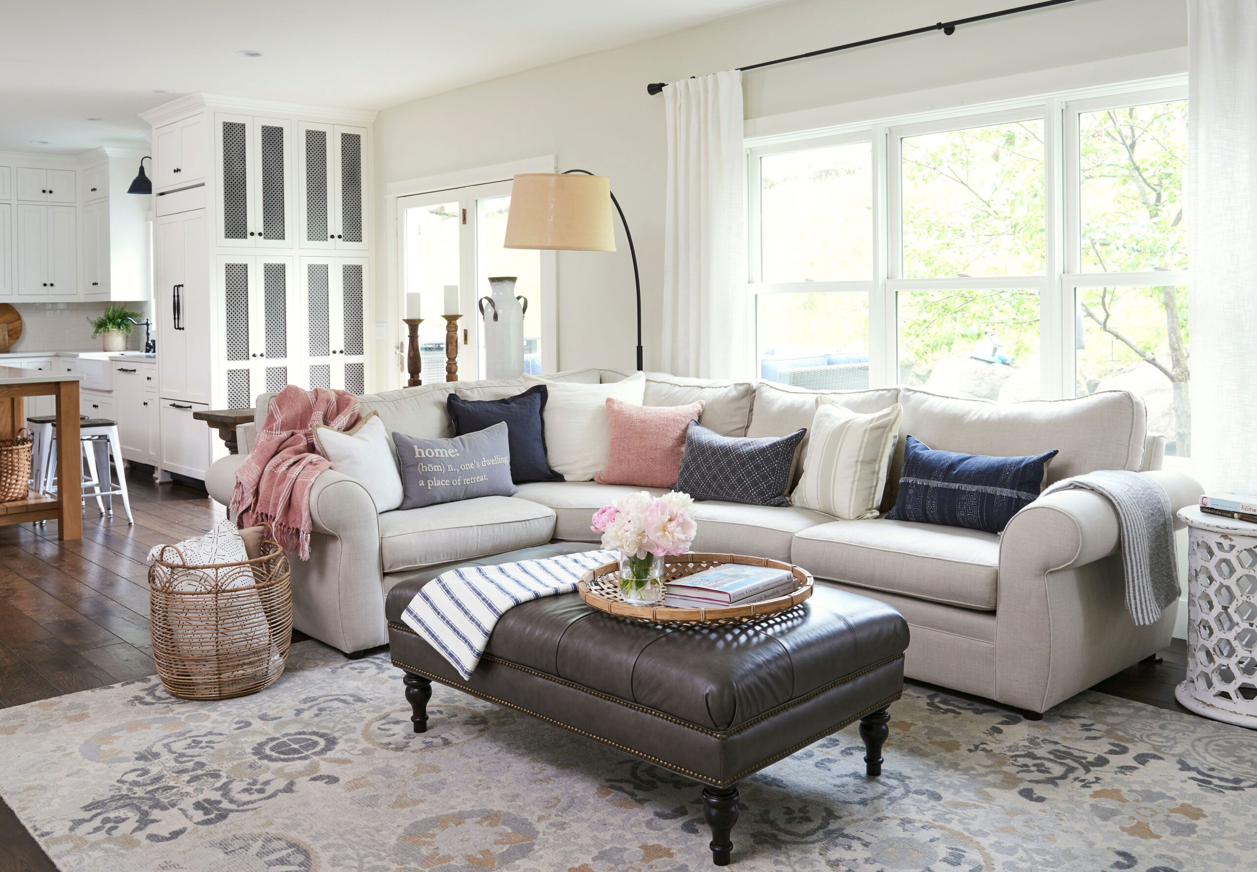 A living room storage with a coffee table and storage ottomans<br />
